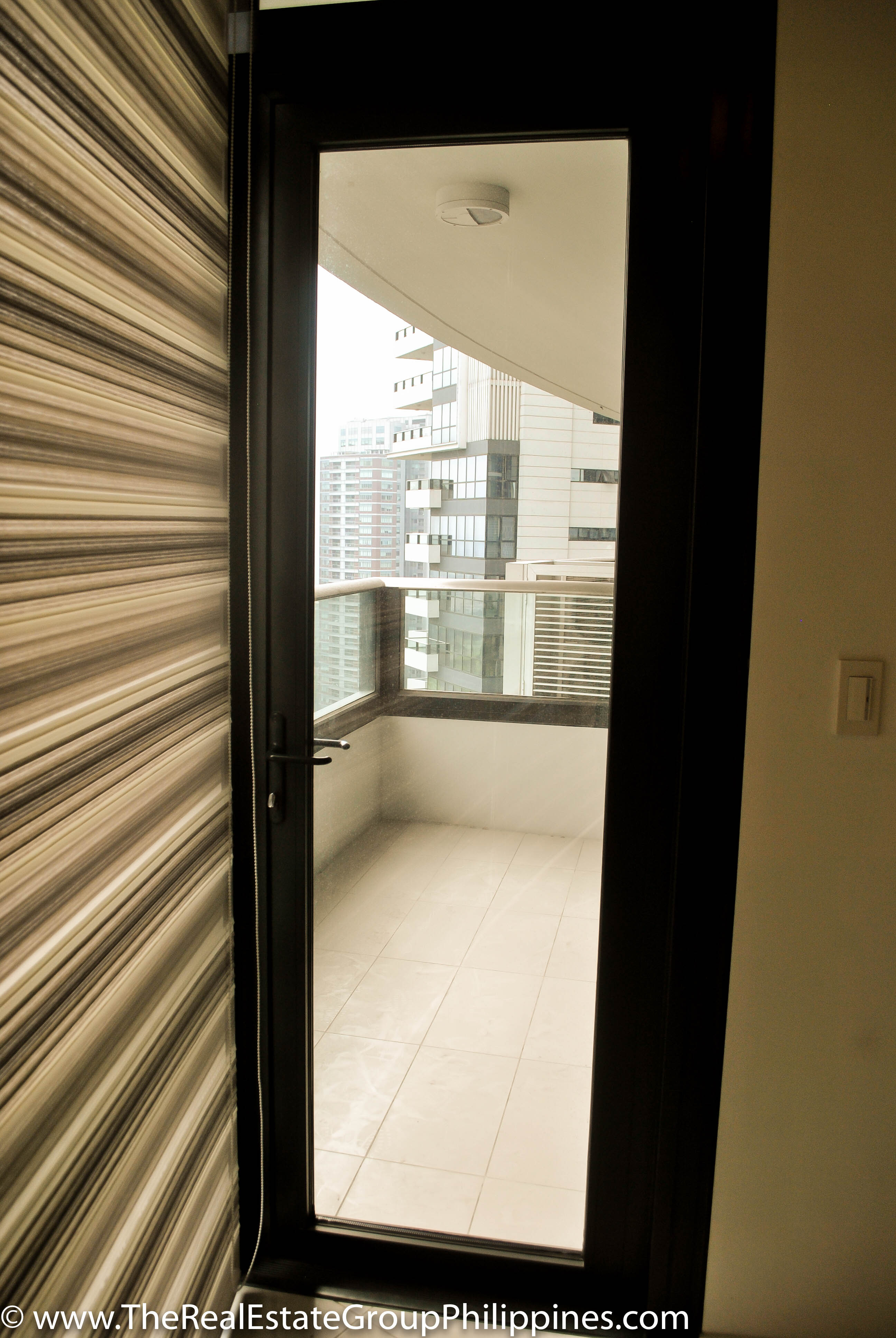2BR Arya Residences For Rent Balcony Access Door